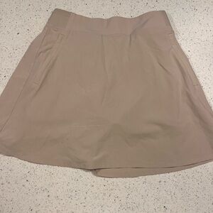 Athleta Beige tennis Skirt mid thigh Size 0 but fits like a size 4/6